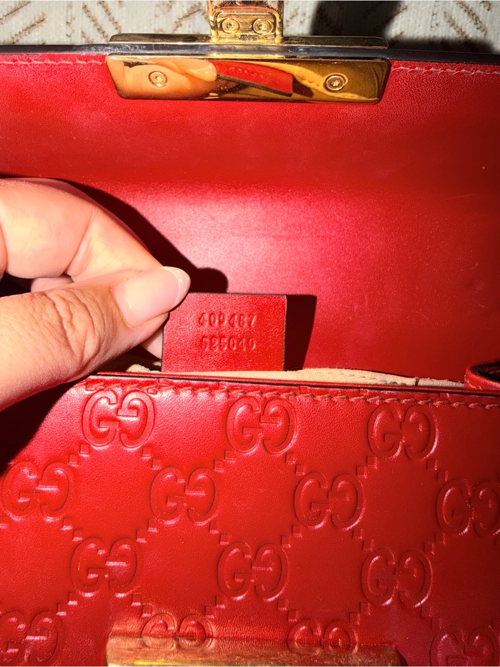 Gucci Red Embossed GG Crossbody Bag with Gold Hardware